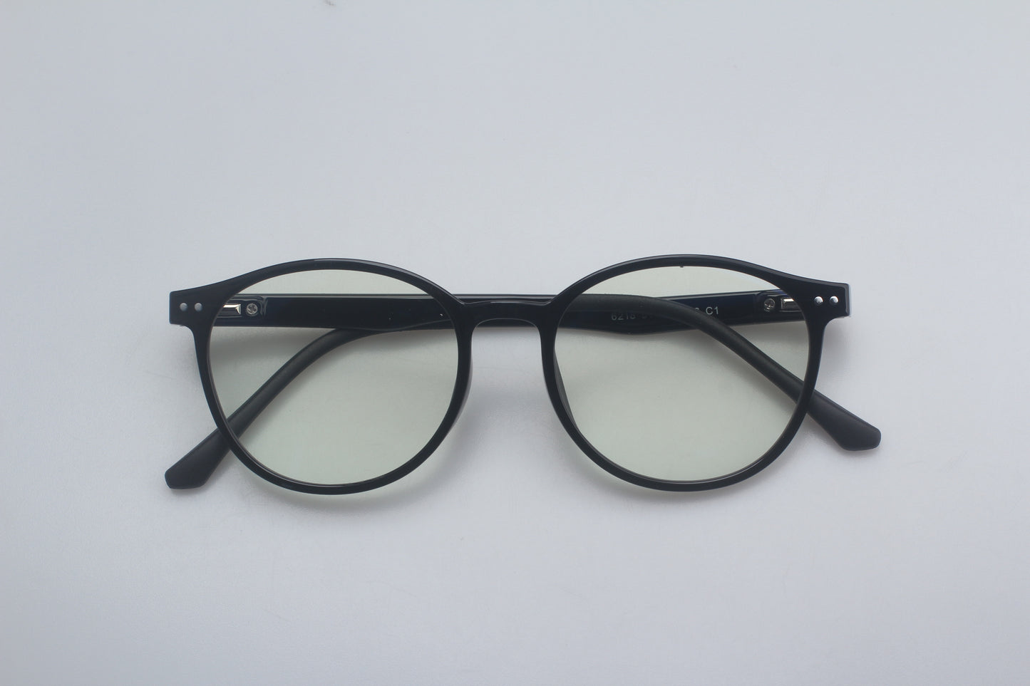 Round black eyeglasses 40% blue blocker on a white background