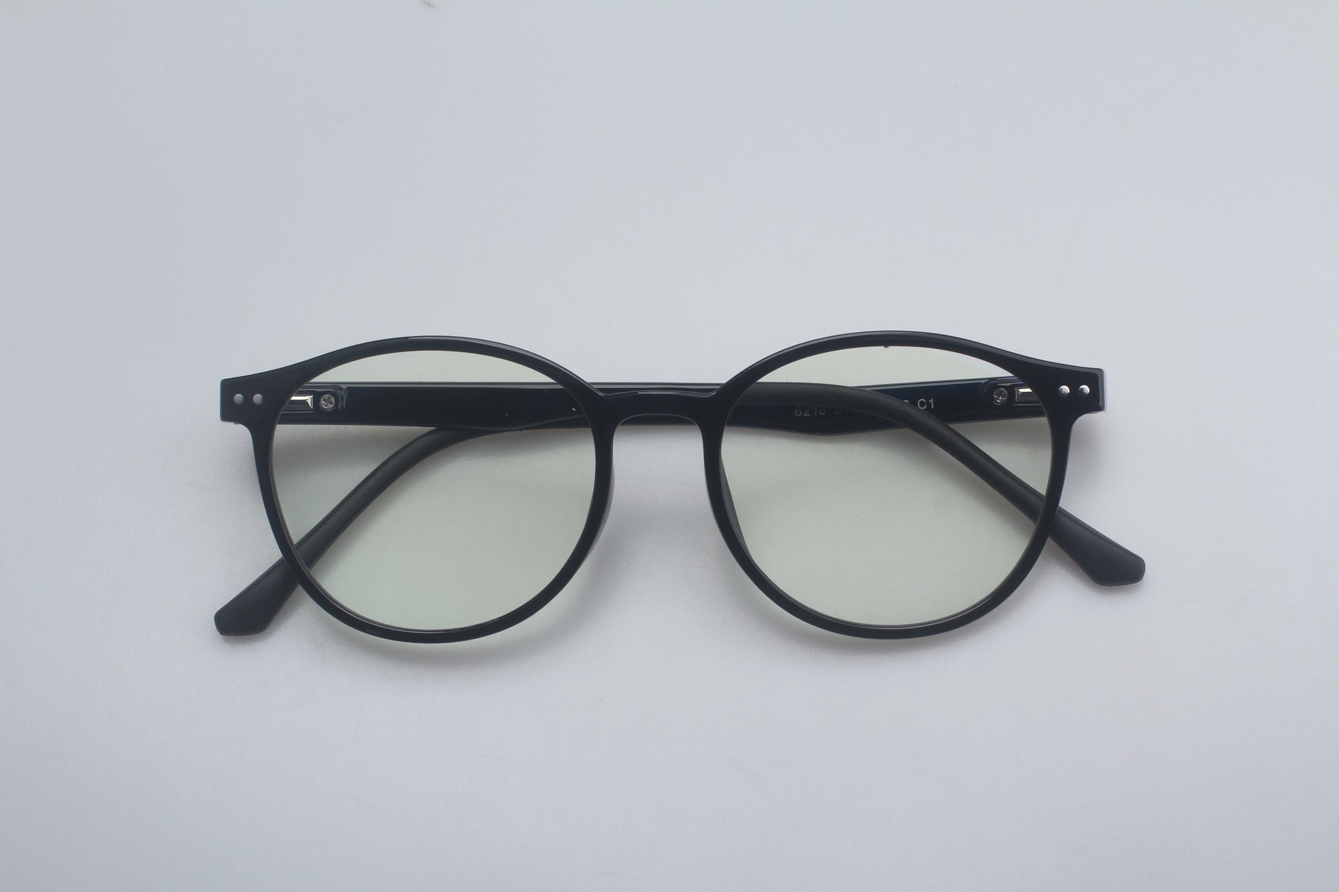 Round black eyeglasses 40% blue blocker on a white background