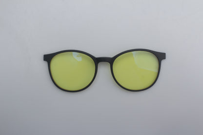 Round Blue blocking glasses with yellow lenses and black frames on a white background